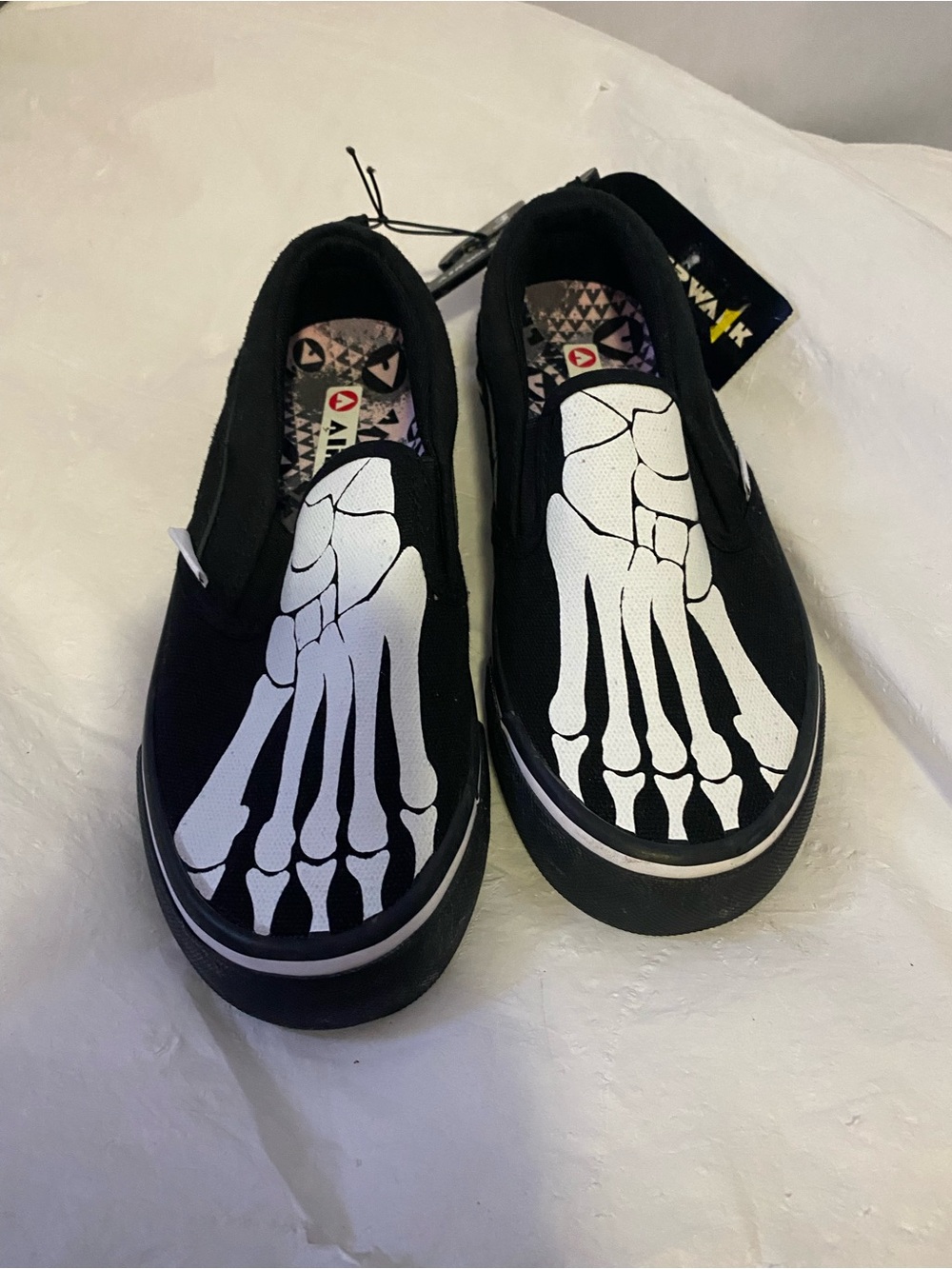 Airwalk Men’s Black Slip-On Sneakers with White Skeleton Foot Graphic